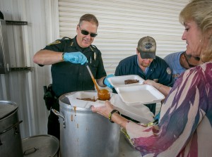 The Lompoc Police Chief helped to serve food at the BBQ