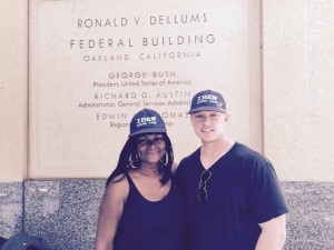 VOC members Alfreda Smith and Braden Warrender proudly don IBEW 1245 hats after the NLRB vote tally 
