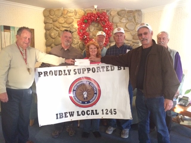From left: Ronald McDonald HOuse CEO Marty Ozer with IBEW 1245 retiree club members Rod Thomas, Rita Weisshaar, Jim Lappin, Cyril Escallier and Ron Borst