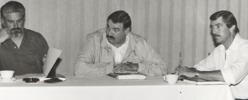 Bob Choate, middle, on a PG&E bargaining committee in the early 1980s. At right is committee member Larry Pierce, who was hired onto the Local 1245 staff about the same time as Choate.