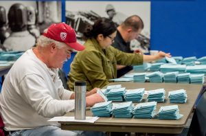 Members of the Ballot Committee sort and count votes at Weakley Hall on Dec. 13, 2016
