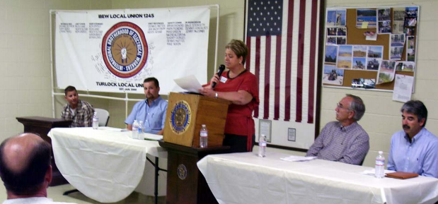 District 3 candidate Pamela Sweeten speaks at the candidates’ forum hosted by IBEW Local 1245’s unit at  Turlock Irrigation District. Unit chairman Aaron Baker is seated at the far left. 