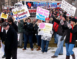 Thousands came out in Wisconsin to protest the governor's proposal to terminate their right to collective bargaining, causing some to compare the protest to the uprising in Egypt.