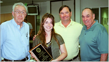 From left: President Mike Davis presents the 2011 Al Sandoval Award to Mandy Vucurovich, daughter of Local 1245 member Matthew Vucurovich. The contest was judged by former Business Manager Perry Zimmerman.