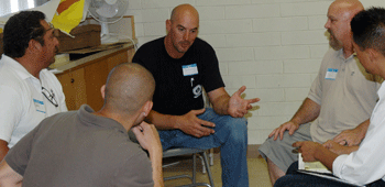 Adrian Lomas speaks up at a small group discussion at the Fresno leadership training.