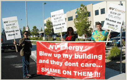 Mayra Politis, center, pickets NV Energy in Las Vegas on May 3, 2011, joining a protest at the company's shareholder meeting.
