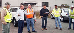 Keep the Clearance committee member Justin Casey discusses the Close Call program with Davey Tree members in Oakland. From left: Davey Tree Safety Manager Dave Handt, (Casey), Local 1245 Business Representatives Rich Lane and Junior Ornelas, along with members at Davey Tree.