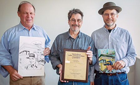 Business Manager Tom Dalzell, left, shows the original artwork for the comic book history of IBEW 1245, while Tom “tk” Christopher displays the award the project received from the International Labor Communications Association. Eric Wolfe, right co-wrote the script with Christopher. Photo by John Storey