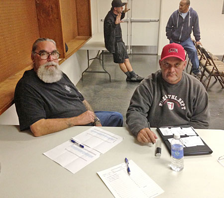 Gary Silbaugh, left, and Dave Paretti signed people in and handed out ballots for the ratification vote. Photos by Pat Waite