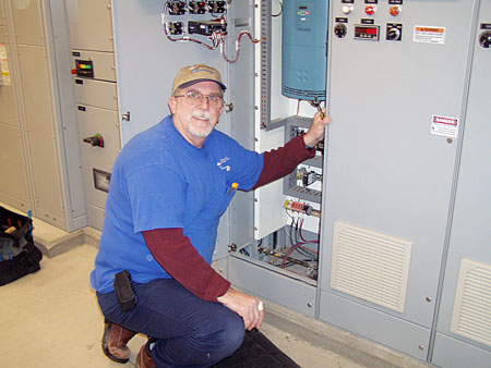Alleman test-runs a pump motor at one of Bella Vista’s Pump Stations.