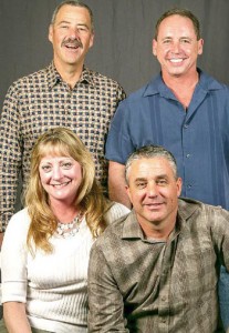 30 years -- Standing, from left: Jeff Wolford and Randy Burke. Seated, from left: Maureen Bird and Ron Horner.