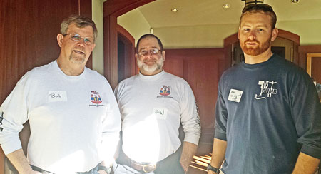 Bob Springer, left, John Kent and Mike Von Egmond, right, discussed the importance of the Hold the Pull peer initiative at the PG&E Safety Kickoff in El Cerrito. 