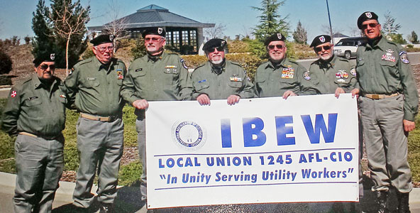 Members of the Honor Guard recognize the gift from IBEW 1245 at the Sacramento Valley Veterans Cemetery. 