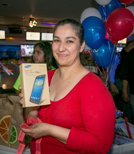 Veronica De Luna from the PG&E Sacramento Call Center, won a Samsung tablet in the raffle.