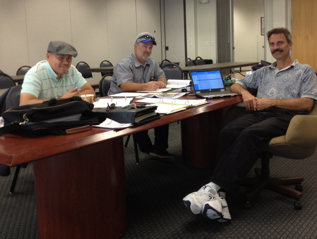 Members of the AC Transit negotiating committee  (left to right)  John Seeto, Kevin Auer and Dale Brewer as they reviewed proposals and  prepared for bargaining.