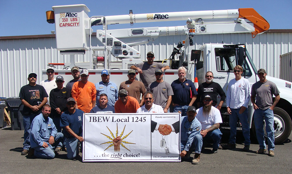 Members of the IBEW 1245 Hold the Pull committee with lineworkers from the City of Lompoc
