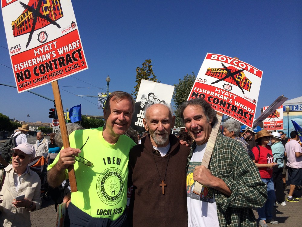 United for Labor on Labor Day: IBEW 1245 Fred Ross (left) with UNITE HERE's Mike Casey and clergy activist Fr. Louie Vitale at the UNITE HERE local 2 Labor Day rally in support of hotel workers in San Francisco