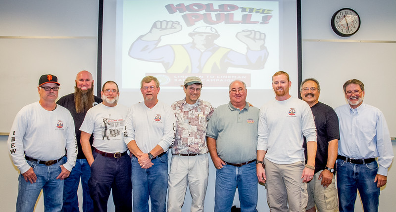 IBEW 1245 Communications Director Eric Wolfe (center) with members of the Hold the Pull committee