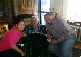 102-year-old voter Marie Nader with IBEW 1245 campaigners Melissa Becerril and P.J. Saenz.