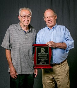Mike Davis, left, is the second-longest serving president in the history of IBEW 1245, holding office since 2004. The plaque presented to him by Business Manager Tom Dalzell notes:  “We are stronger and more effective today because of Mike’s foresight and courage.”