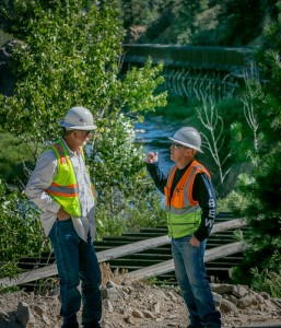Callahan and Chadwick talk shop at the site of the new flume. The old flume can be seen in the background.