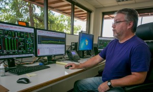 Ted Saxe, water treatment foreman, monitors treatment processes from the control room.