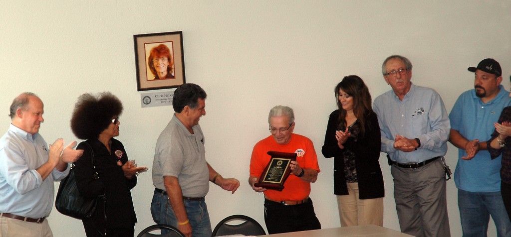 President Art Freitas presented Chris' husband with a commemorative plaque