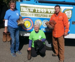IBEW 1245 Member & Veterans’ Group Member Erick Varela delivers boots to Bev Olson and Anne Poole, co-coordinators of the clothing drive for this year’s  North Coast Stand Down.