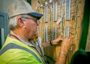 "IBEW 1245 member David Mason works at a senior apartment complex for Frontier Communications in Elk Grove, Calif.,  on July 28th, 2015."