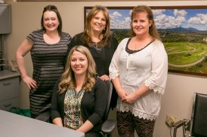 IBEW 1245 members, from left to right, Kristin Bryant, Virginia Farr, Patty Breedlove and Ashley Lindell (sitting), at the BVWD offices