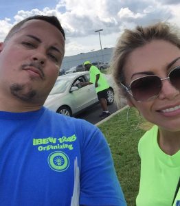 Organizing Stewards Miguel Pagan and Mary Corrente snapped a selfie while hand-billing
