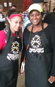 Donchele Spor and Jasmine Williams volunteered at the food bank