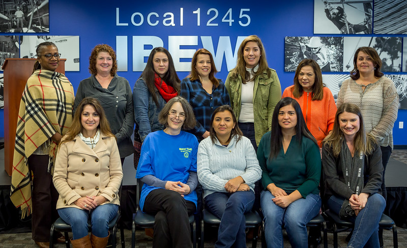 Carla Silva (front row, center) and women of IBEW 1245's staff
