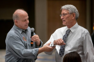 Dalzell admires the cufflinks