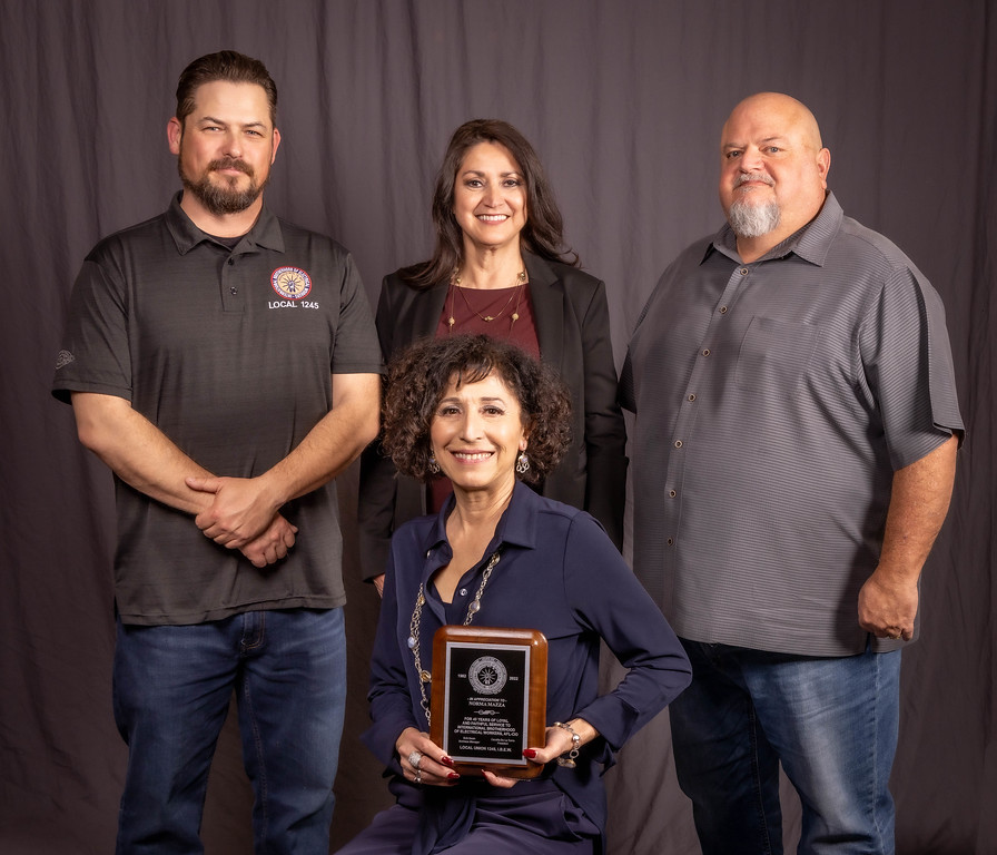 40 year member Norma Mazza (front, center) with Executive Board Member Robert Mohler, President Cecelia De La Torre, and Business Manager Bob Dean. 