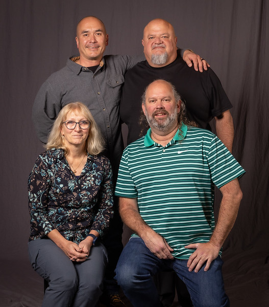 25 year members. Back row, from left: Chris Fong, and Business Manager Bob Dean. Front row: Lynne Goldhammer, and Caleb Waters. 
