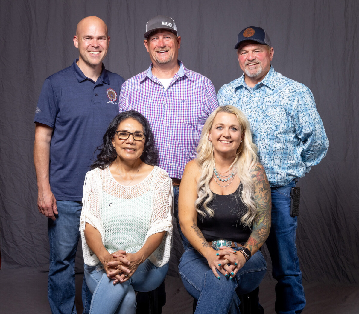 15 year members, from left: Front row- Judy Maestas and Karyn Charmbury. Back row- Senior Assistant Business Manager Dylan Gottfried, Lenny Weatherall and Business Rep Todd Wooten. 