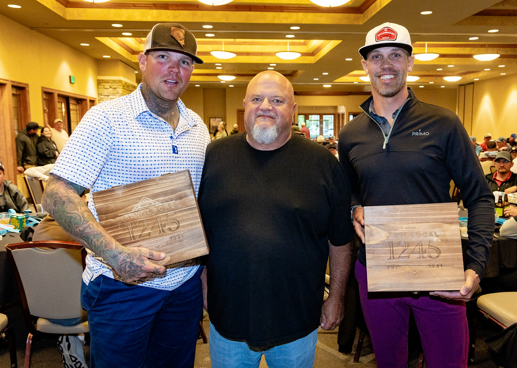 Business Manager Bob Dean with tournament winners Travis and Nick Rains (the other half of their foursome had to leave early)