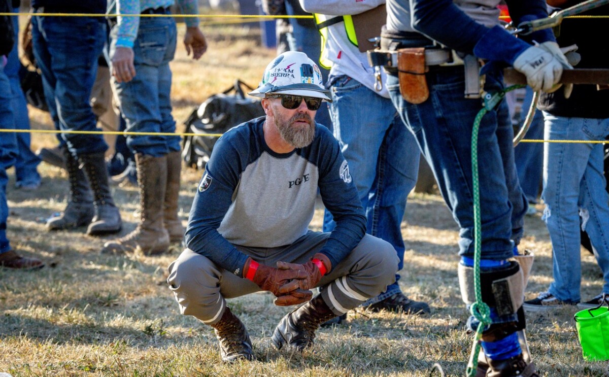 The PG&E team of Brandon Dance, Francisco Flores and Dustin Curry in the Pole Climb event. The International Lineman’s Rodeo in Bonner Springs, Kansas on October 19, 2024.