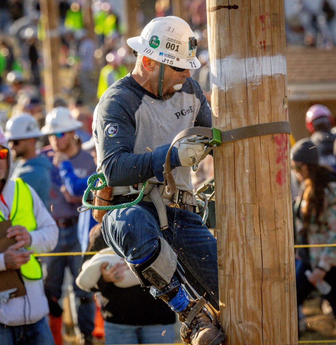 The PG&E team of Brandon Dance, Francisco Flores and Dustin Curry in the Pole Climb event. The International Lineman’s Rodeo in Bonner Springs, Kansas on October 19, 2024.