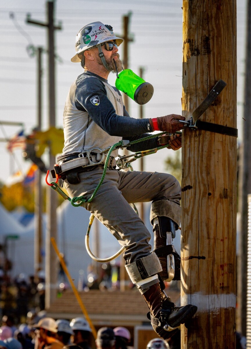 The PG&E team of Brandon Dance, Francisco Flores and Dustin Curry in the Pole Climb event. The International Lineman’s Rodeo in Bonner Springs, Kansas on October 19, 2024.