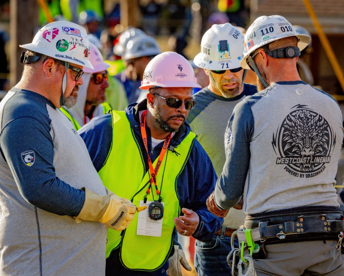 The PG&E team of Brandon Dance, Francisco Flores and Dustin Curry in the Pole Climb event. The International Lineman’s Rodeo in Bonner Springs, Kansas on October 19, 2024.