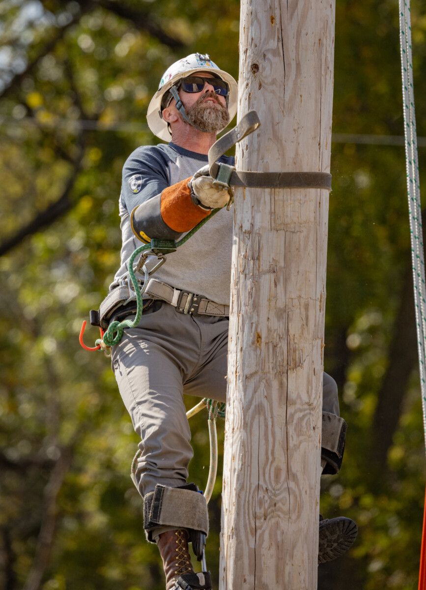 The PG&E team of Brandon Dance, Francisco Flores and Dustin Curry in the Pole Climb event. The International Lineman’s Rodeo in Bonner Springs, Kansas on October 19, 2024.